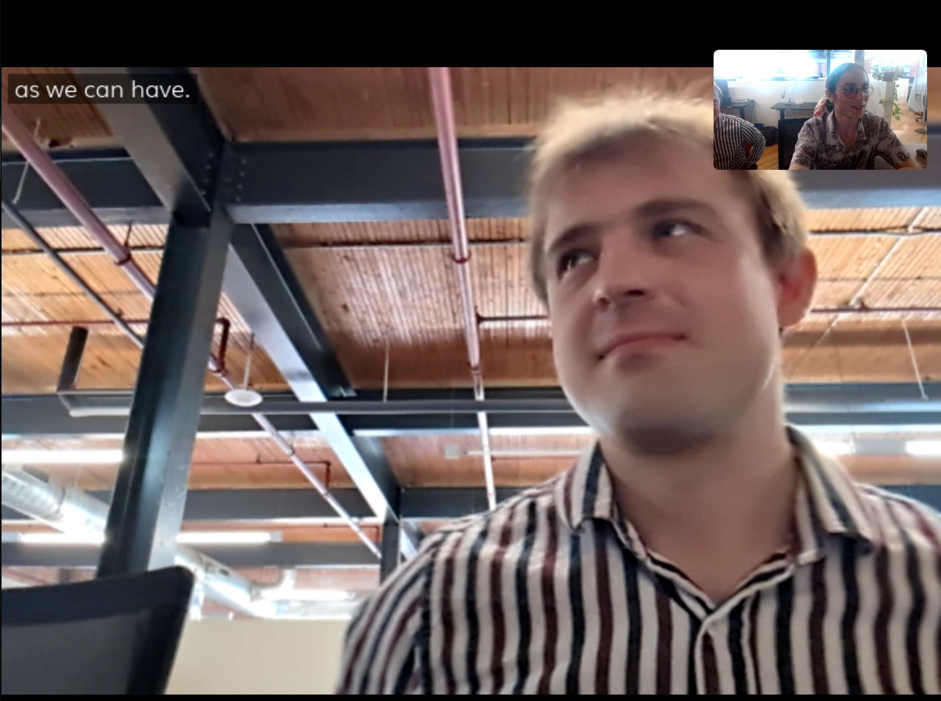 Screenshot of the WhisperTranscript plugin putting subtitles onto a video call